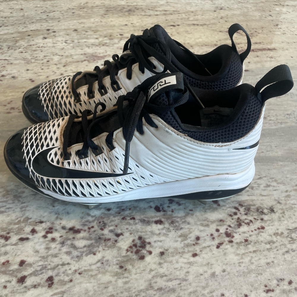 Nike Black and White Metal Cleats.